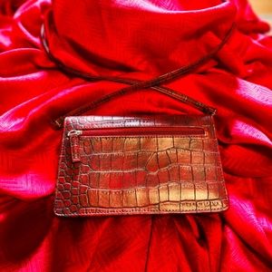 Clutch with strap